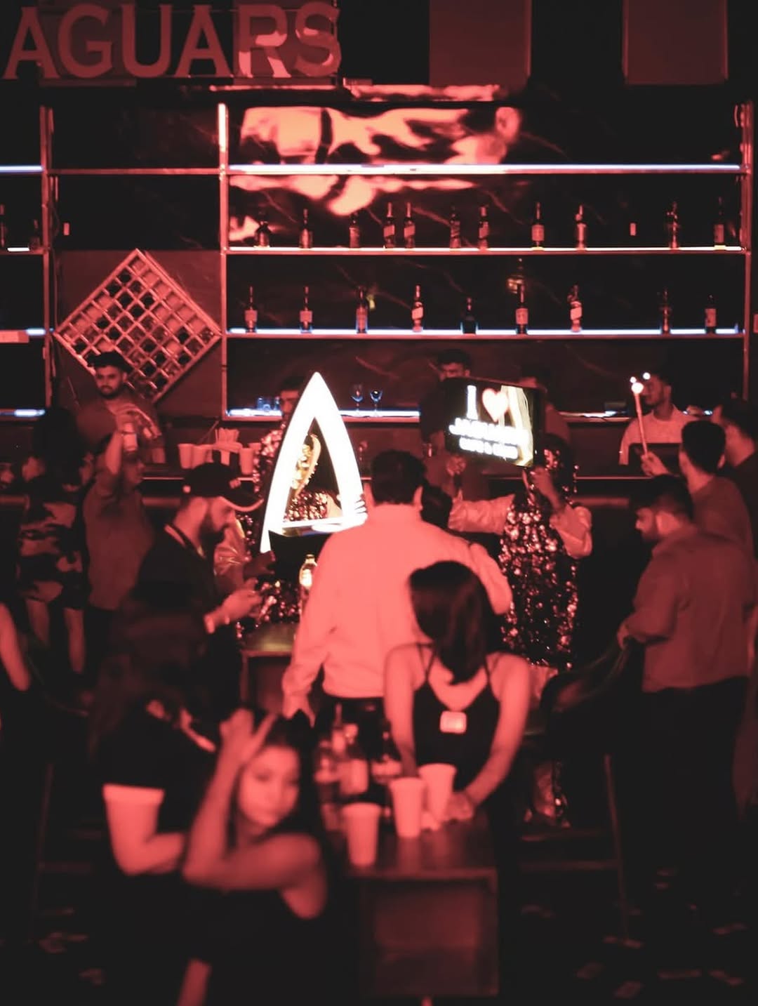 People enjoying nightlife experience at Jaguars Cafe & Club