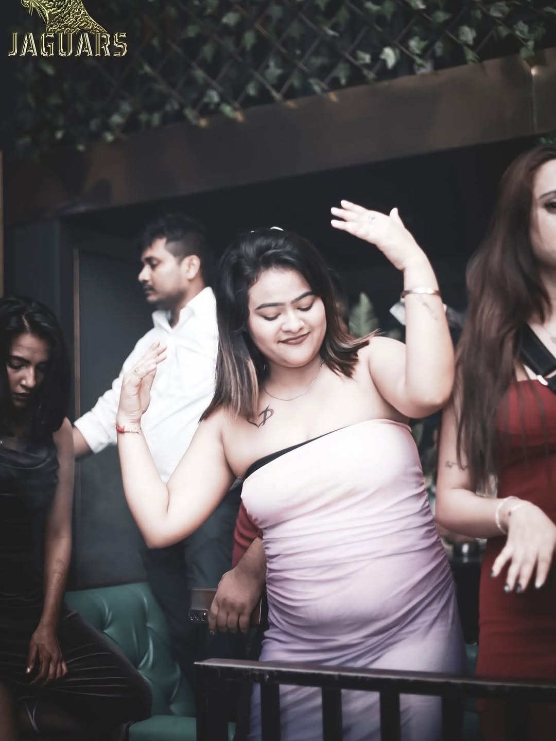 Dance floor crowd enjoying DJ night at best night club